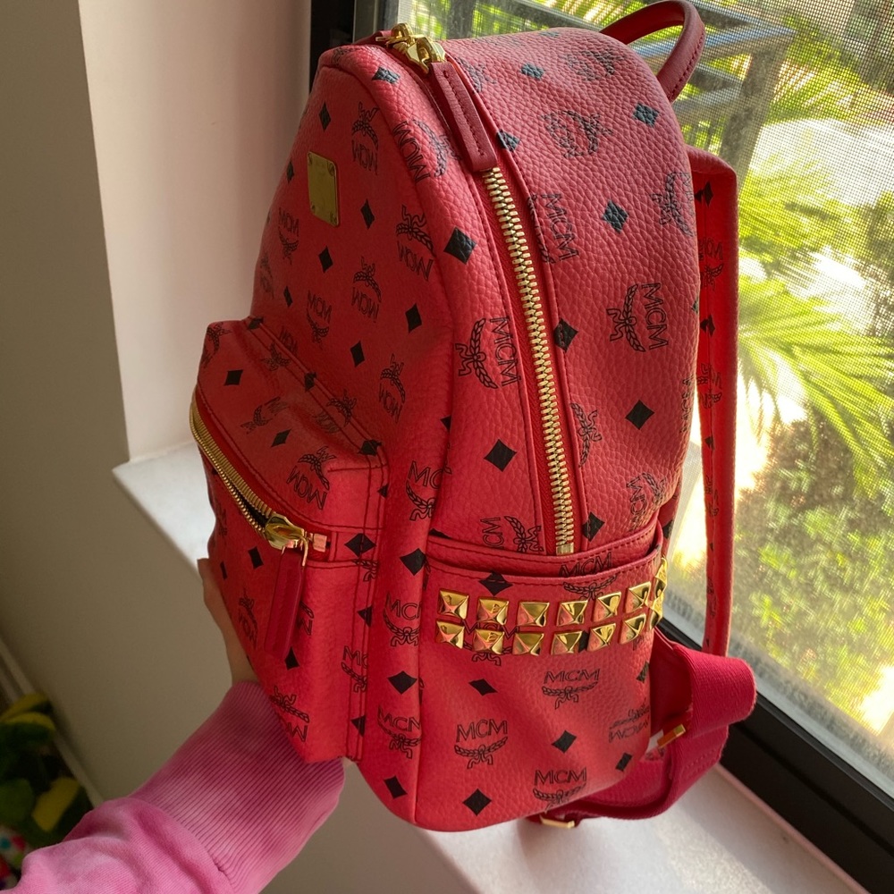 Real hot pink studded MCM backpack, worn about twice beautiful condition 🤍